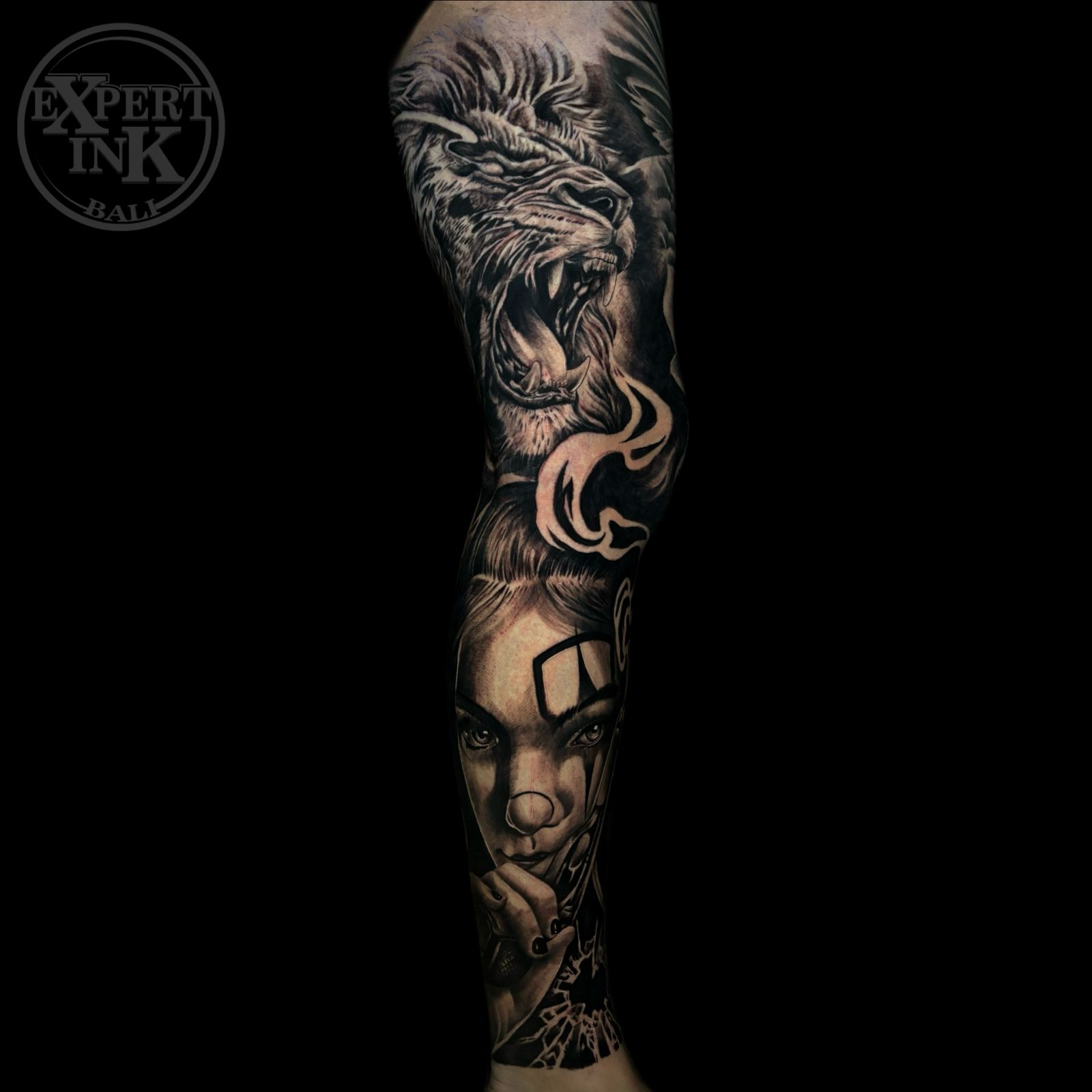 Full sleeve Balinese tattoo on arm featuring traditional and mythological motifs