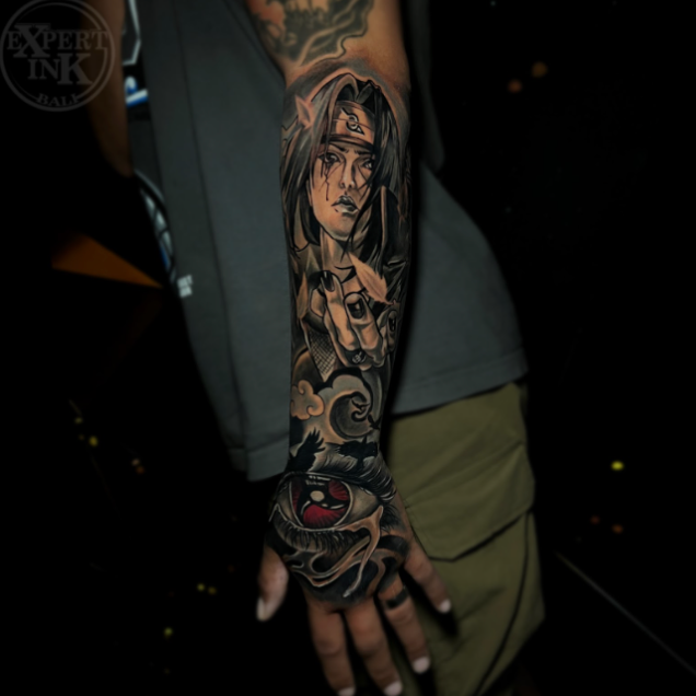 custom anime tattoo at expert ink bali, featuring itachi uchiha epic portrait