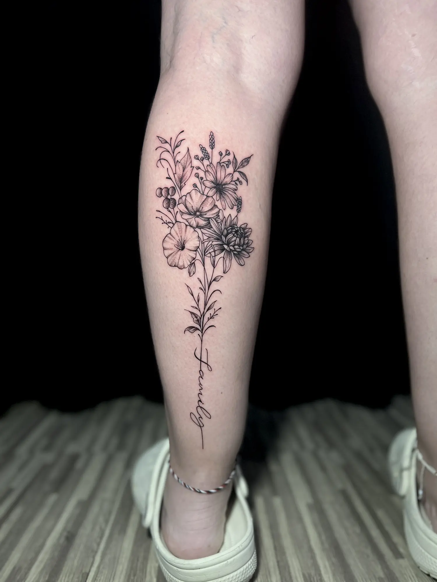 Fine line tattoo kuta with delicate single-needle detailing on the forearm