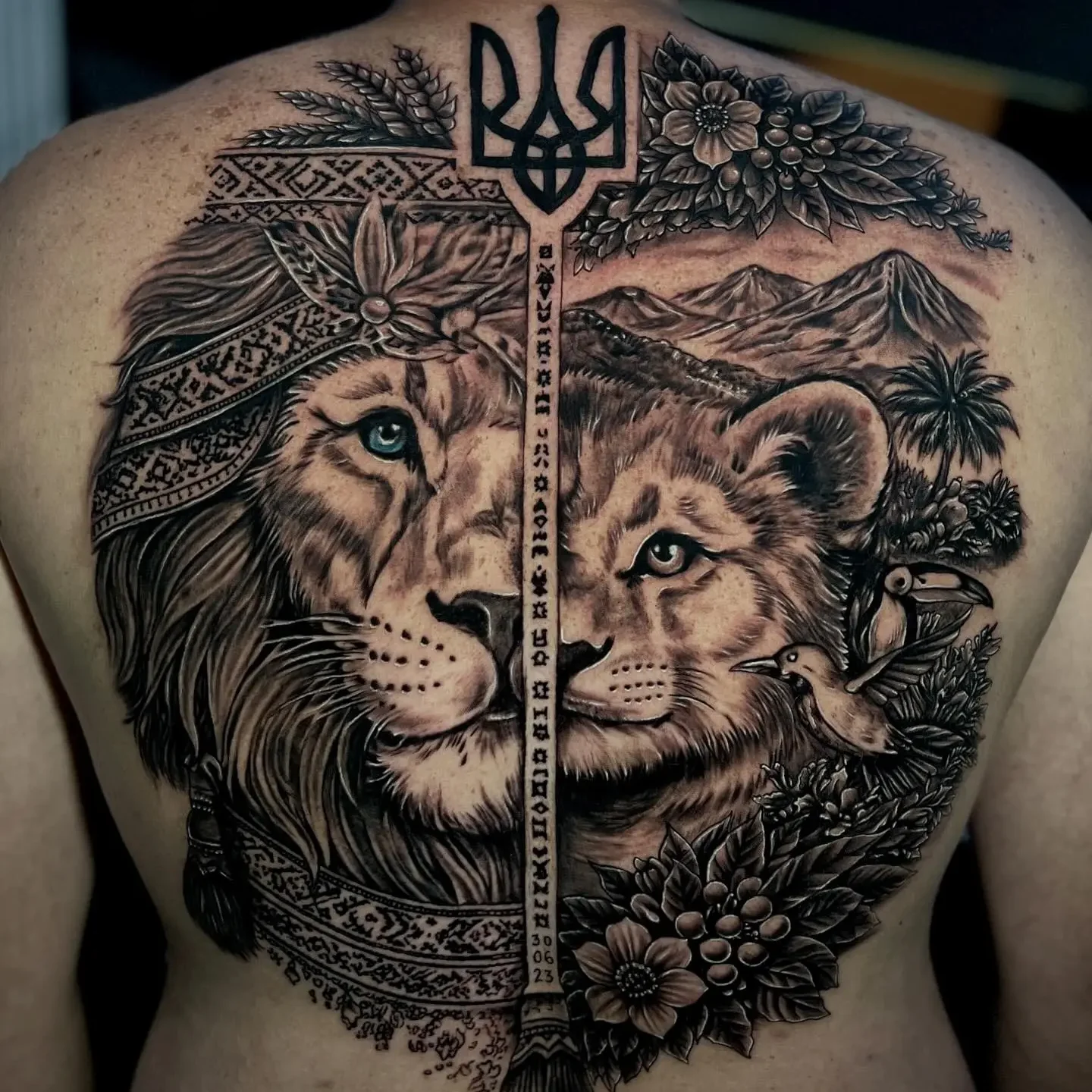 Realistic animal tattoo featuring a detailed wildlife of a Lion and his cub