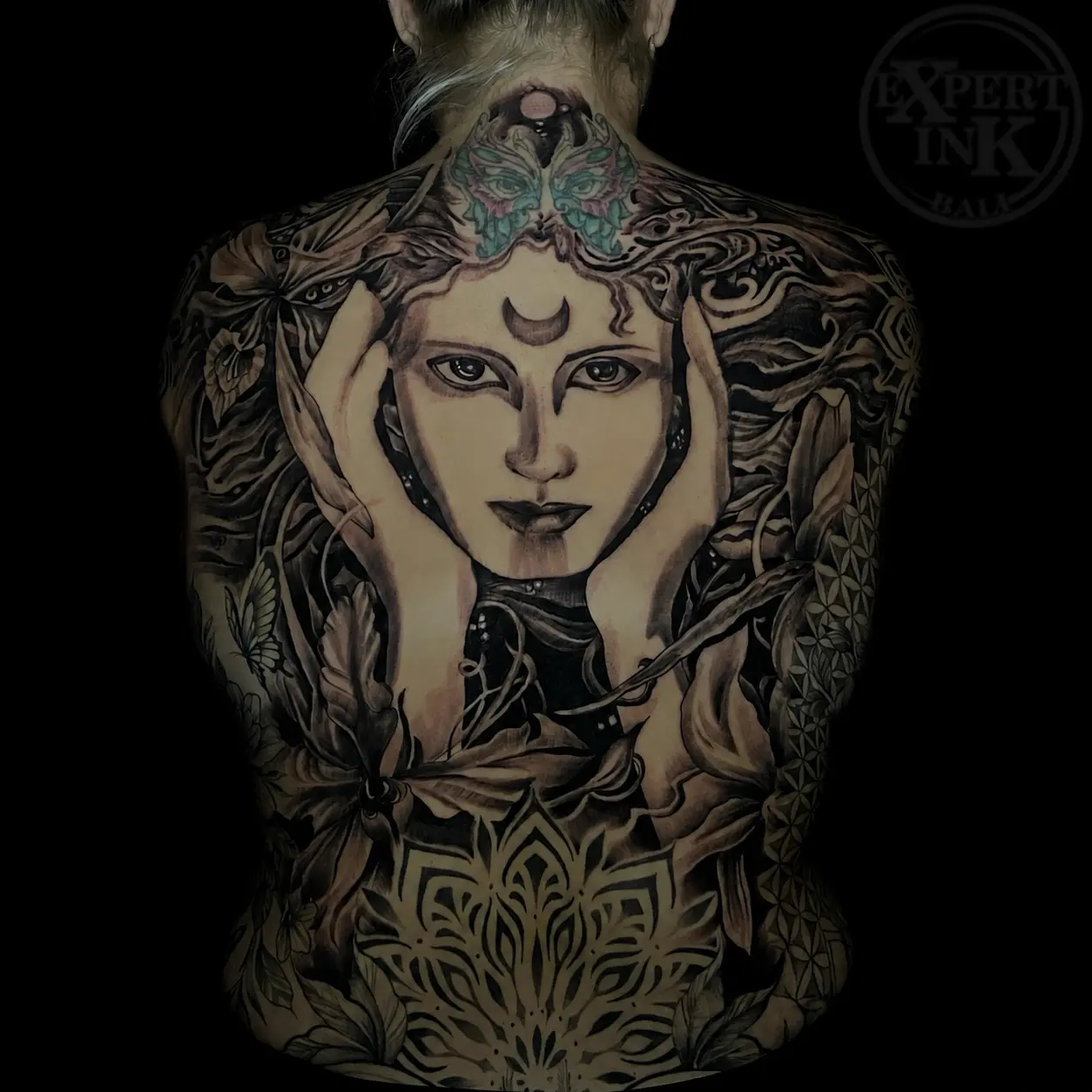 Large-scale backpiece completed at a Kuta tattoo studio, showing detailed shading work